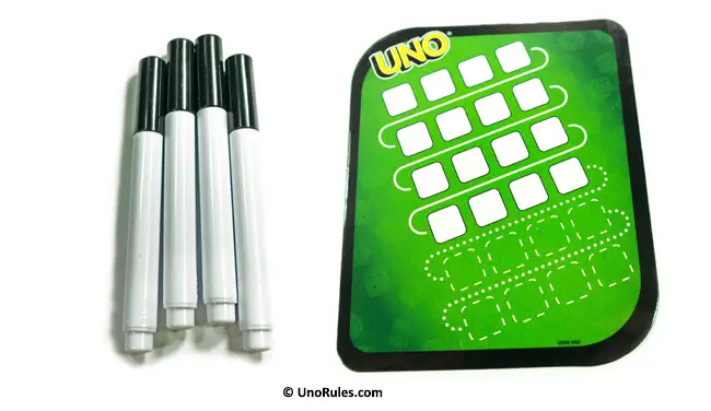 uno dice game pens and game board